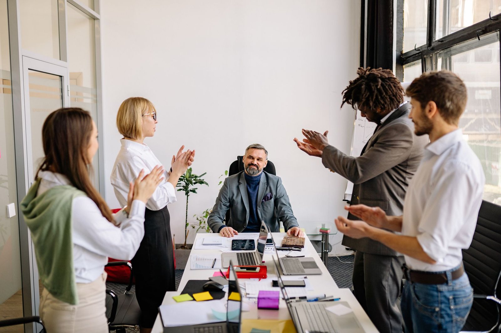 office team standing in the room
