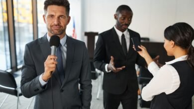 television reporter in front of a conference room