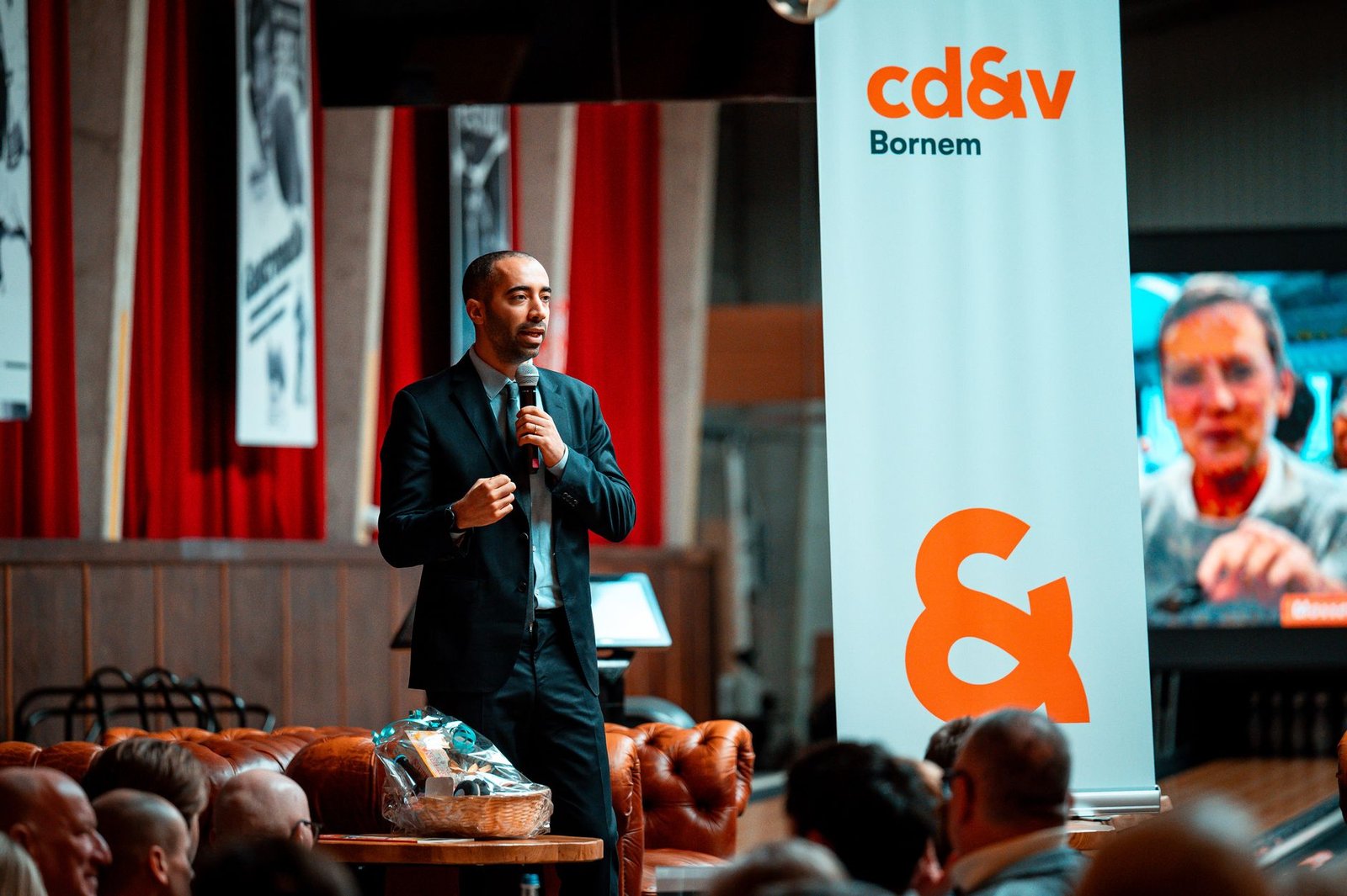 business speaker at indoor conference event