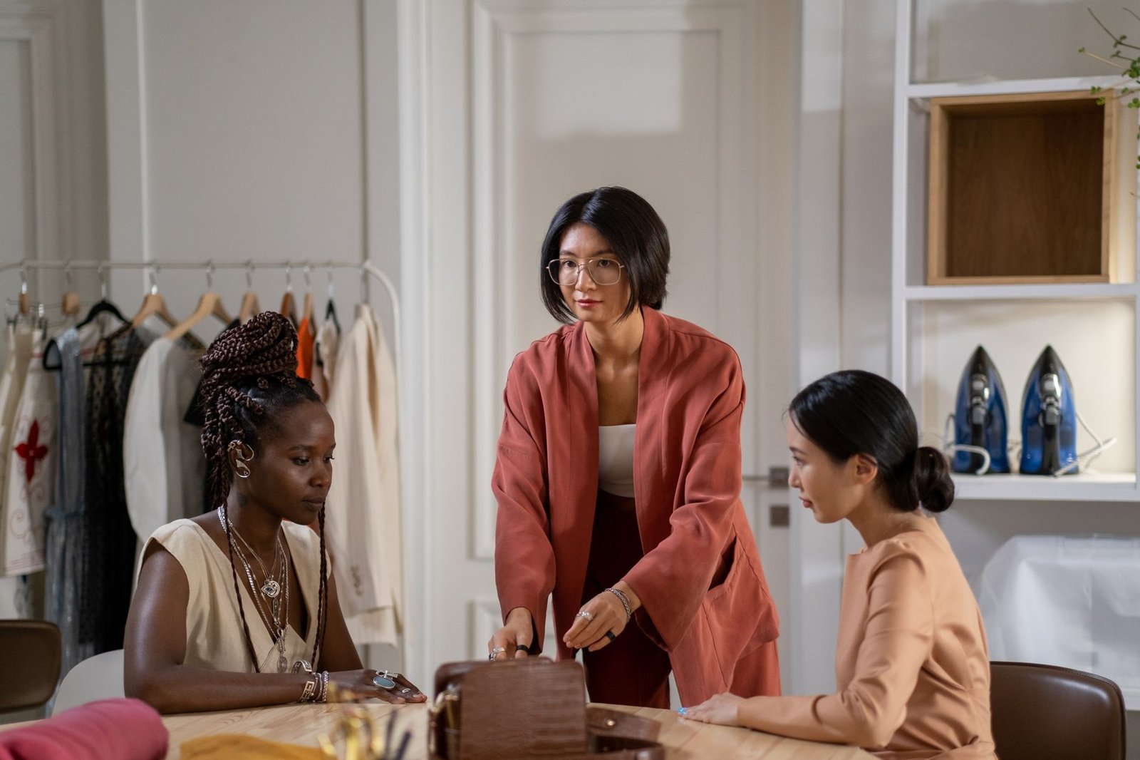 women sitting at the table
