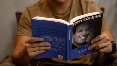 motivational book in hands of man