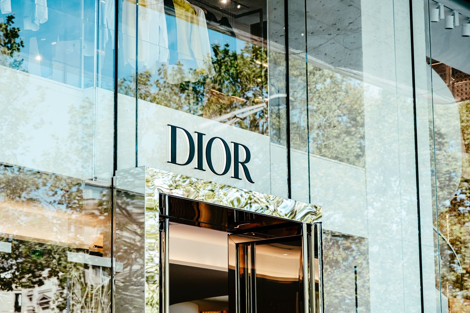 glass wall building with signage