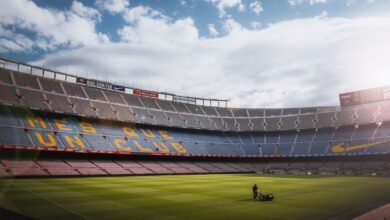 photo of a person standing on football field