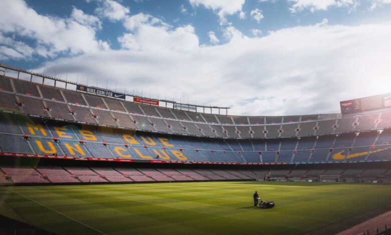 photo of a person standing on football field