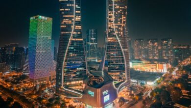 futuristic skyline of illuminated city at night