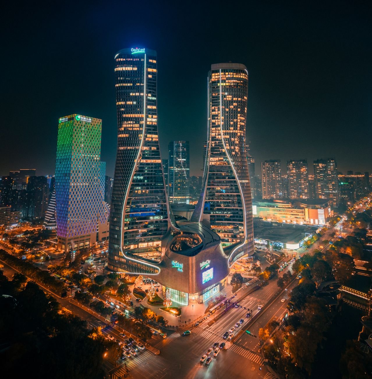 futuristic skyline of illuminated city at night