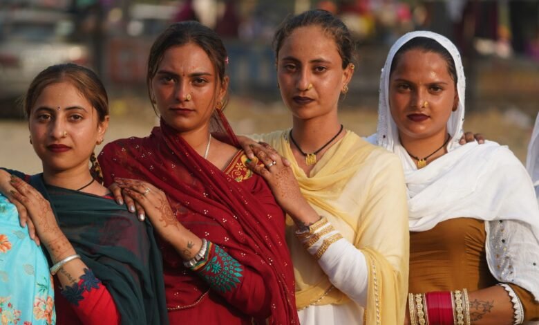 cultural portrait of four women in traditional attire