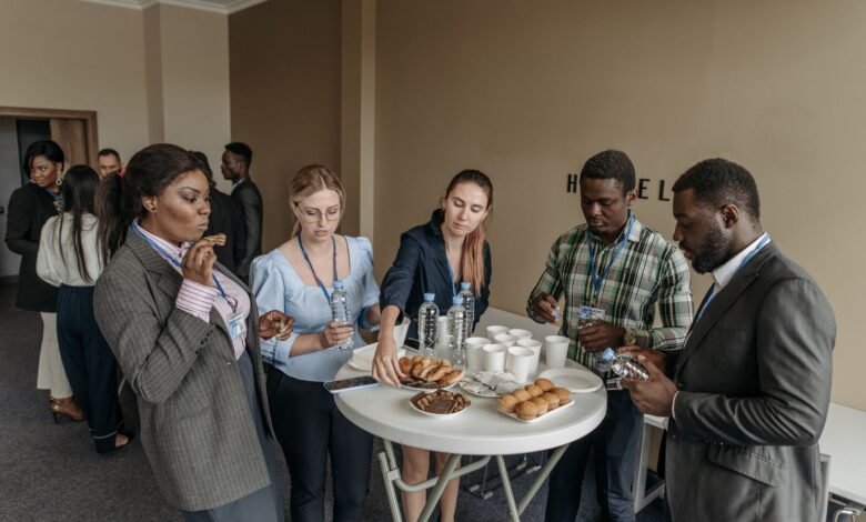 people eating while standing at the table