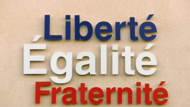 liberty equality and fraternity script on a wall