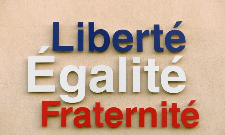 liberty equality and fraternity script on a wall