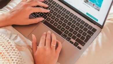 woman hands on laptop