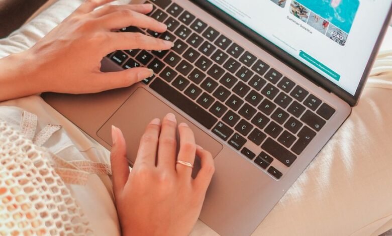 woman hands on laptop