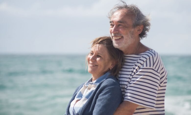 elderly couple hugging