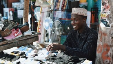 man selling socks on a market