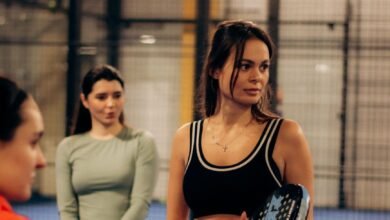 women playing paddle tennis indoors