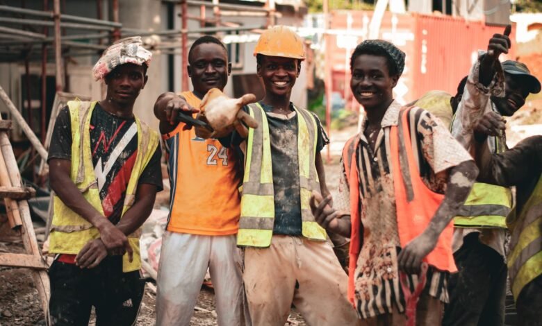 joyful construction workers on a construction site