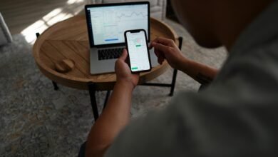 person holding black tablet computer