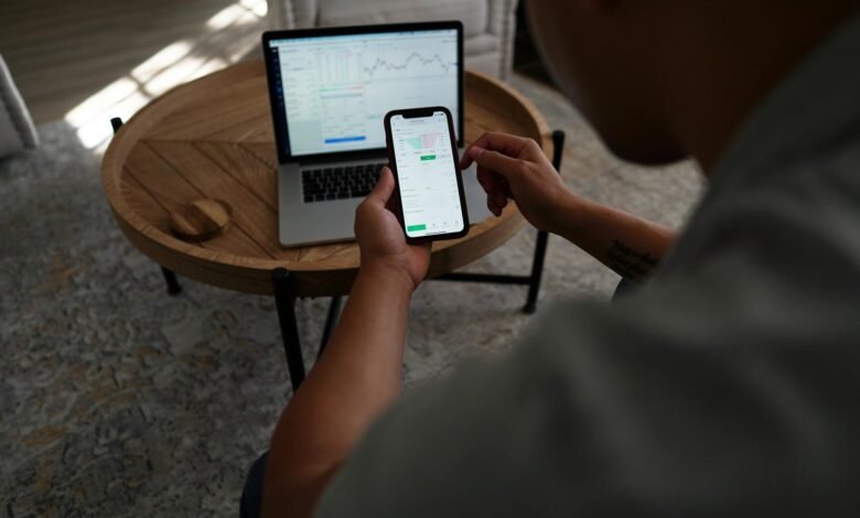 person holding black tablet computer