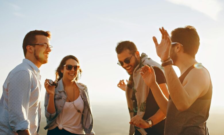 group of people having fun together under the sun