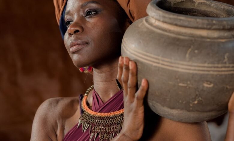 woman carrying a jar