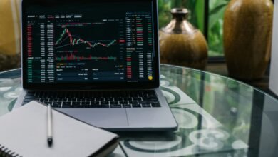 cryptocurrency chart displayed on a laptop