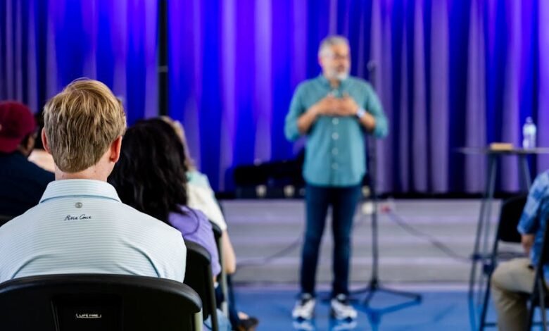 speaker engaging audience in modern conference