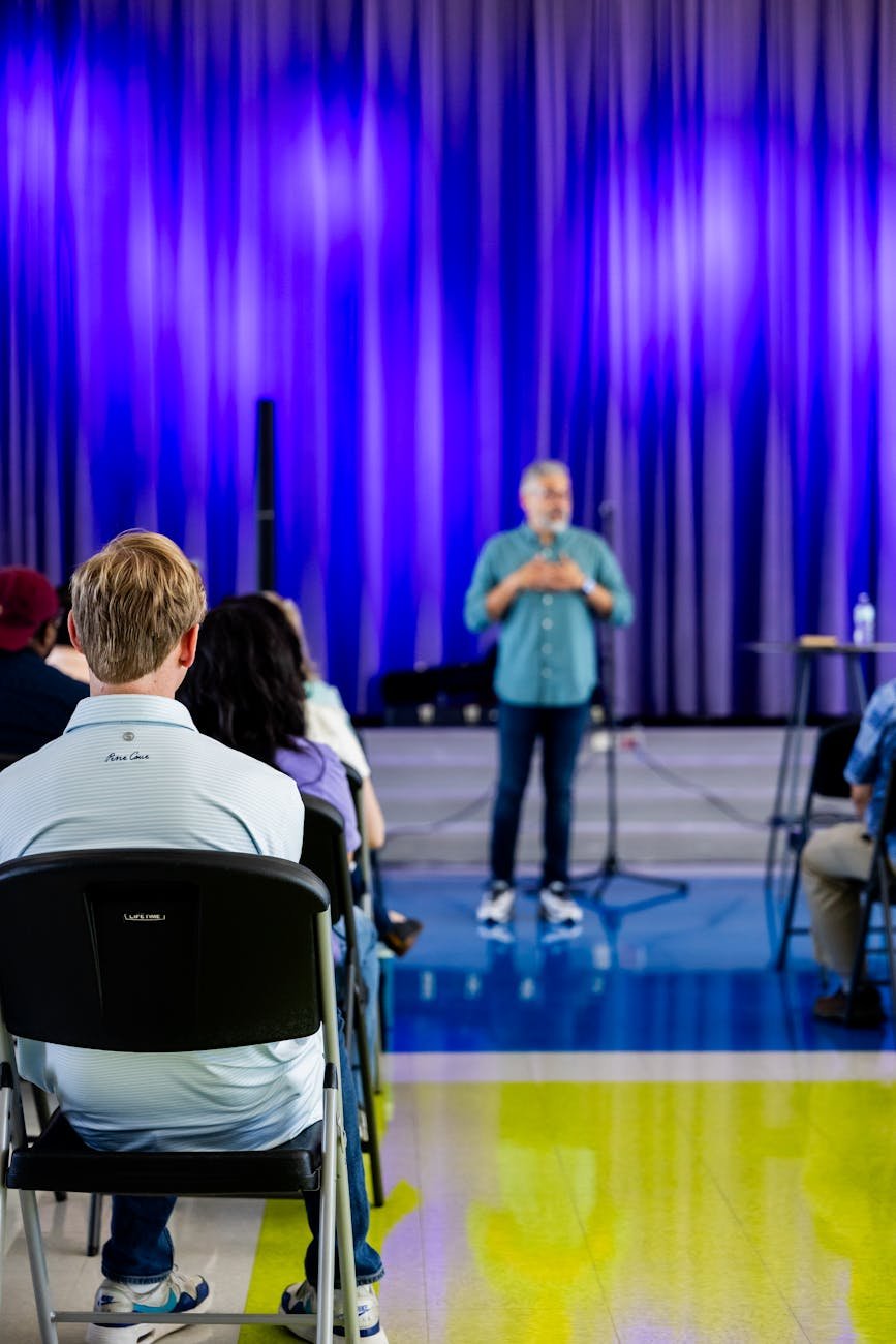 speaker engaging audience in modern conference