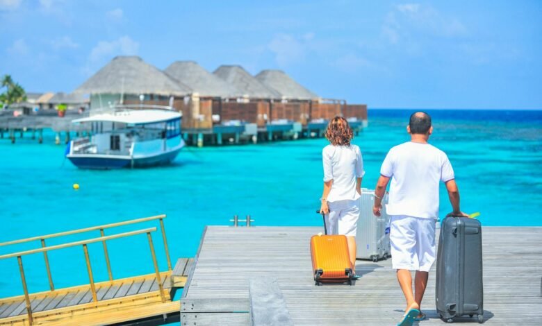 man and woman walks on dock