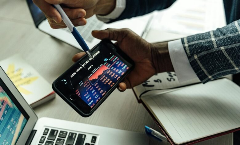 person looking the chart on the smartphone
