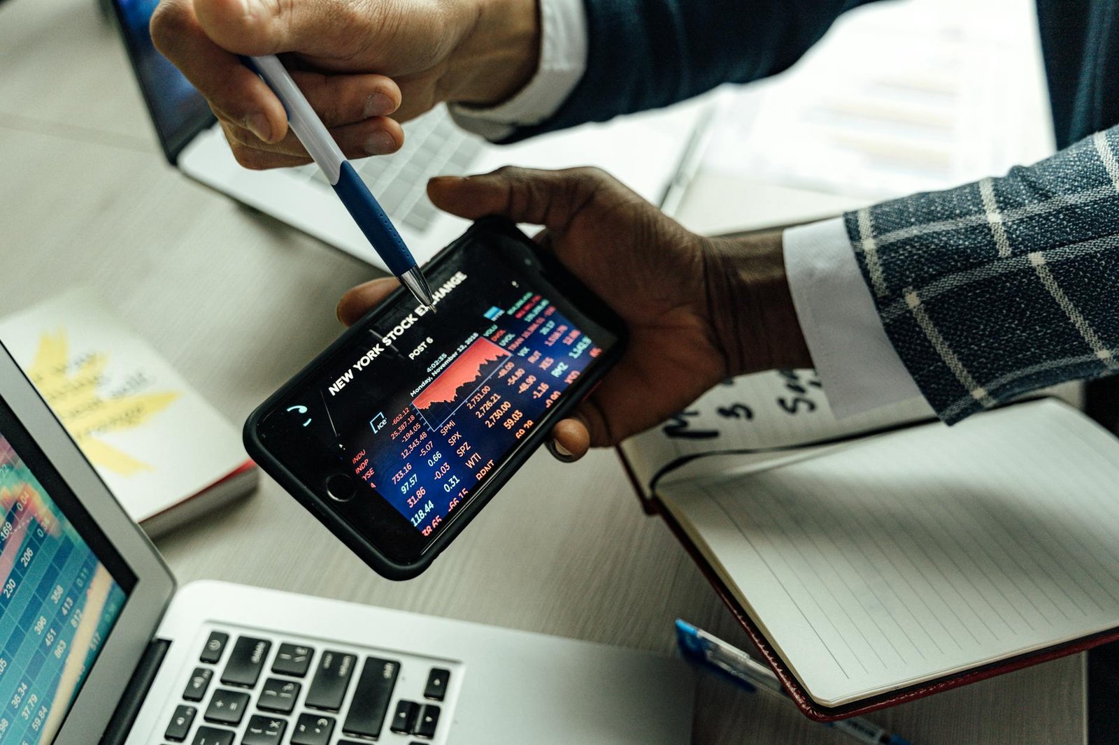 person looking the chart on the smartphone
