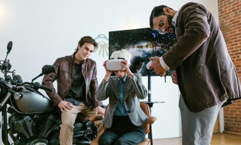 man in brown jacket sitting on black chair holding white ceramic mug