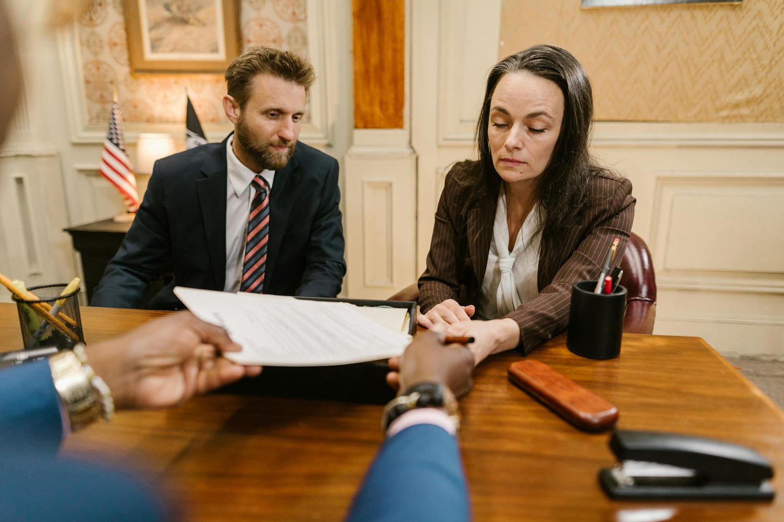 man and woman sitting at the table