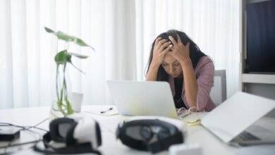photo of a stressed woman at work