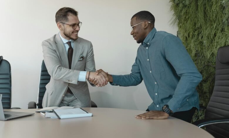 man in blue long sleeve shirt gets the job