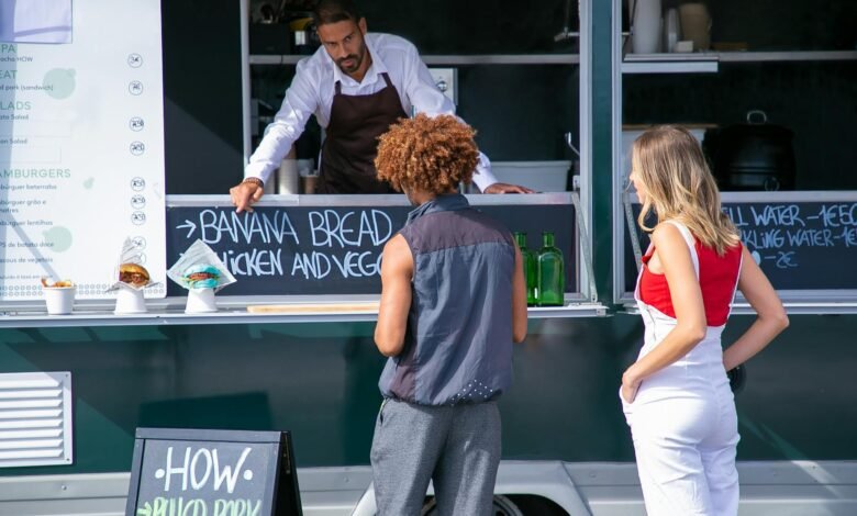 ethnic seller suggesting food to diverse clients