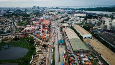 top view of city with port and containers
