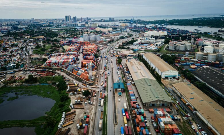 top view of city with port and containers
