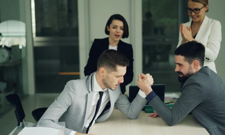 business team arm wrestling competition