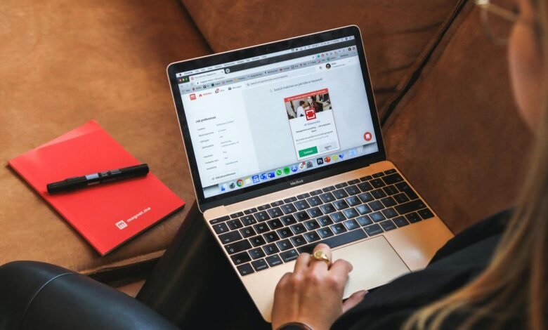 person using laptop on lap