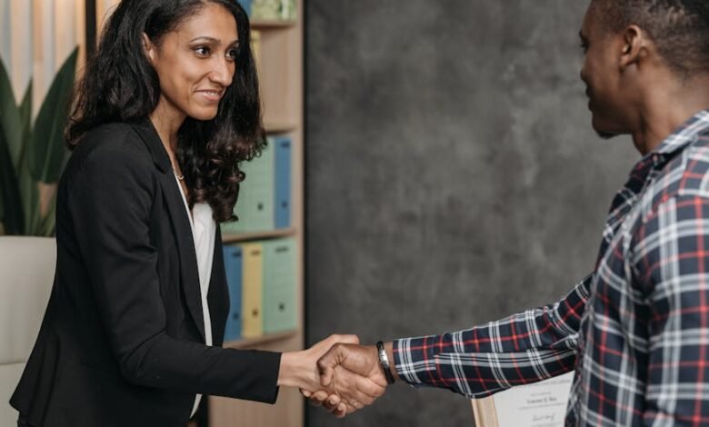 a woman handshake with the client
