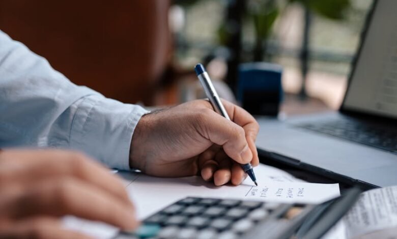 a person using a calculator
