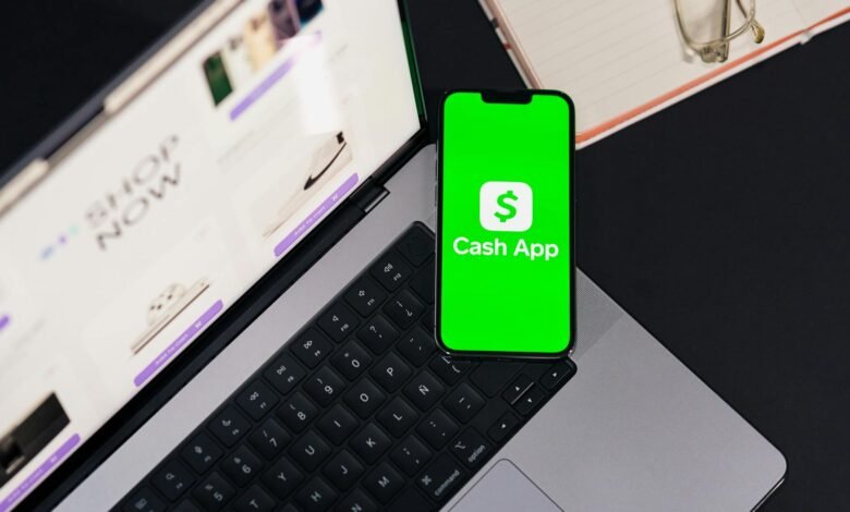 cash app displayed on smartphone and laptop