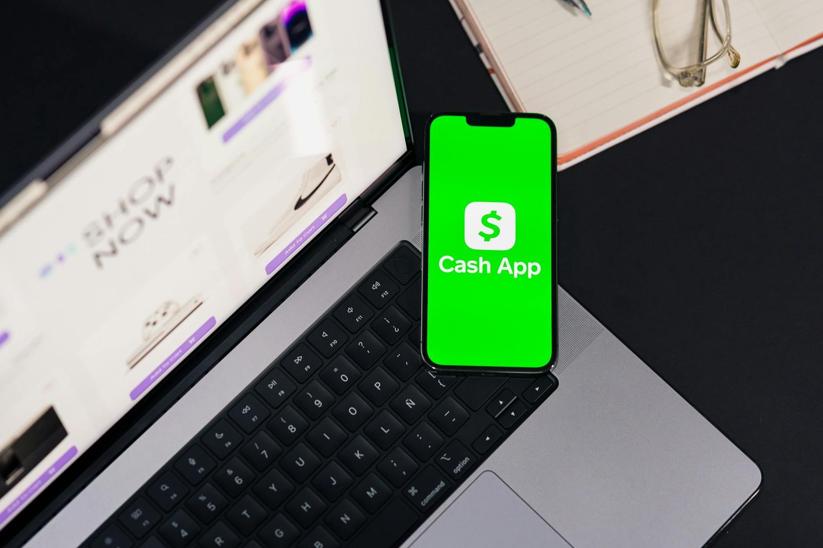 cash app displayed on smartphone and laptop