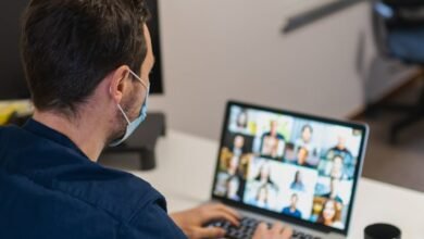 a man having a video call on his laptop
