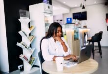 professional woman working in lagos cafe