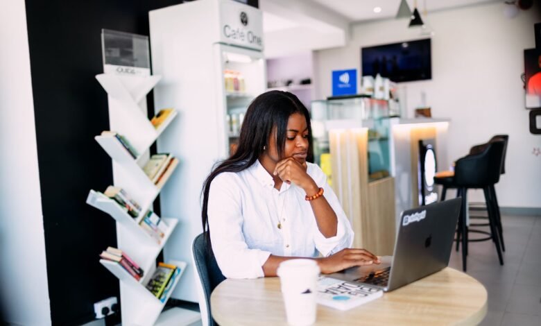 professional woman working in lagos cafe