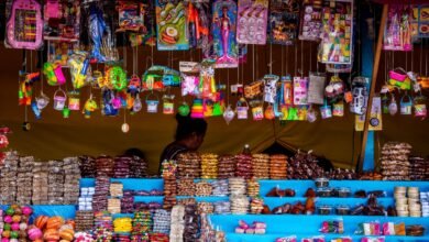 vibrant market stall with sweets and toys in guatemala