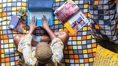 overhead shot of a woman working on her laptop