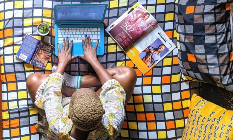 overhead shot of a woman working on her laptop