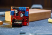 close up of electronic circuit board on table